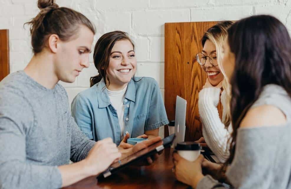 employees smiling and spending time during break